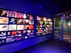 A wall display of ABBA records