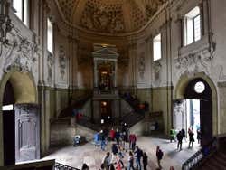 Tourists inside the Royal Palace Hall