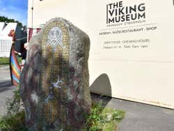 A rock with paintings outside the Viking Museum